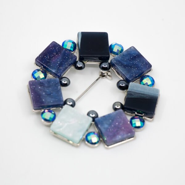 Broche circular de resina azul